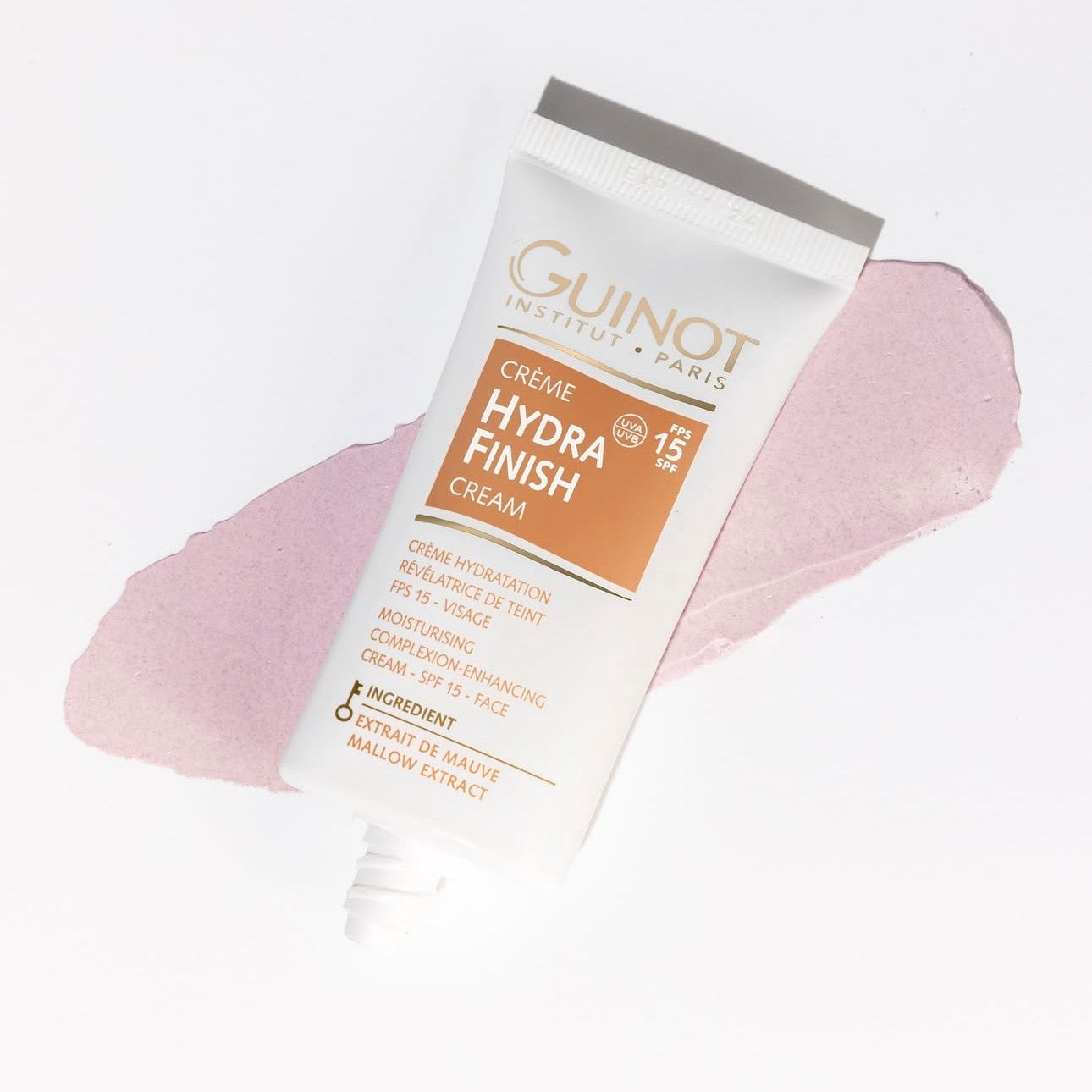 Crème Hydra Finish Guinot SPF15 avec sa texture crème violette