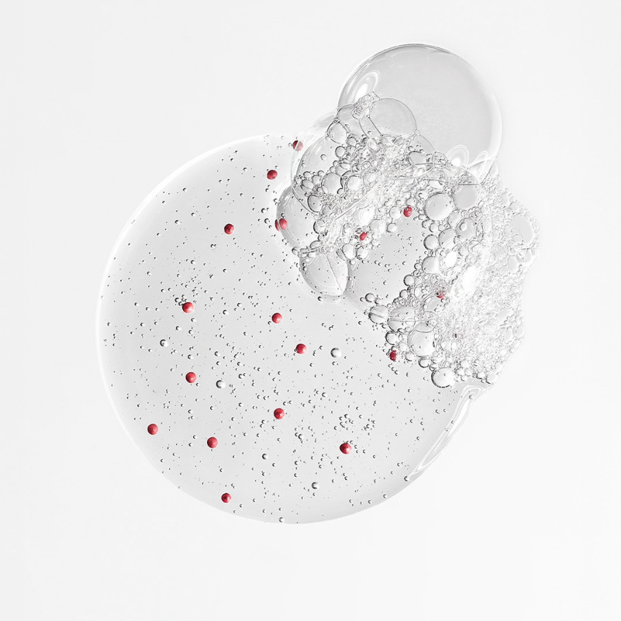 Texture du 60 Gel Nettoyant Fraîcheur Maria Galland qui contient des micro-billes roses qui fondent au contact de la peau.