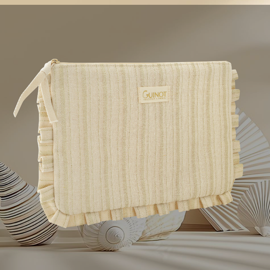 Votre cadeau : La trousse de plage Guinot